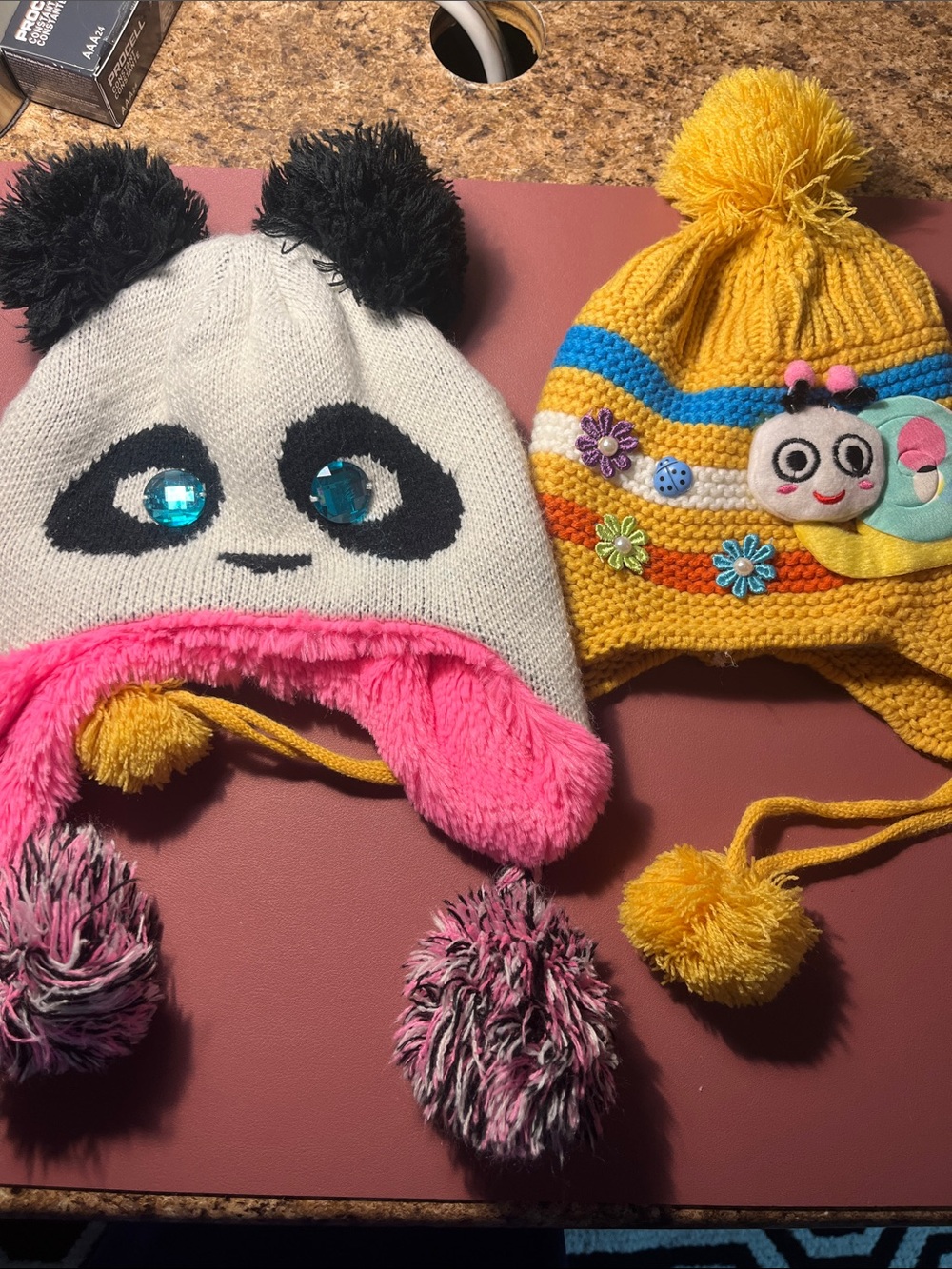 Kids Plush Panda Earflap Hat - White and Pink and a yellow hat with a snail